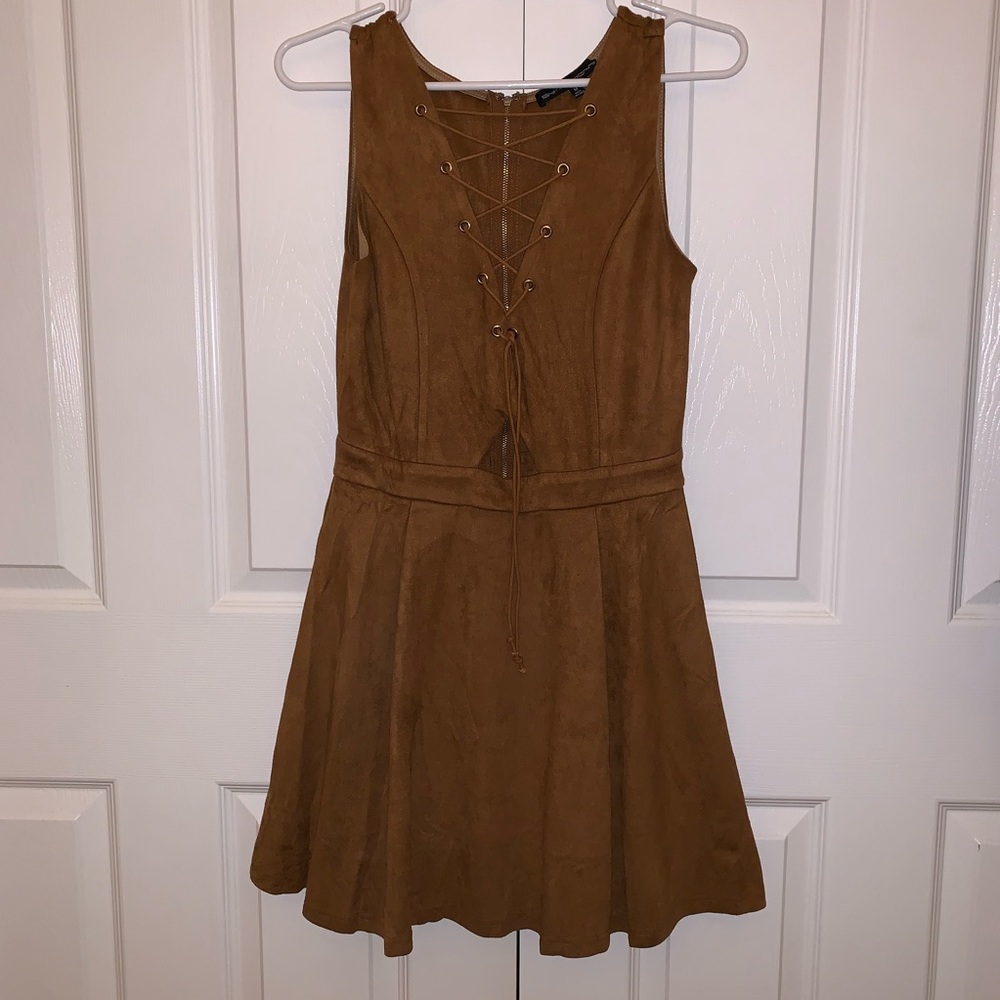 Suede baby doll dress. Adjustable bust.